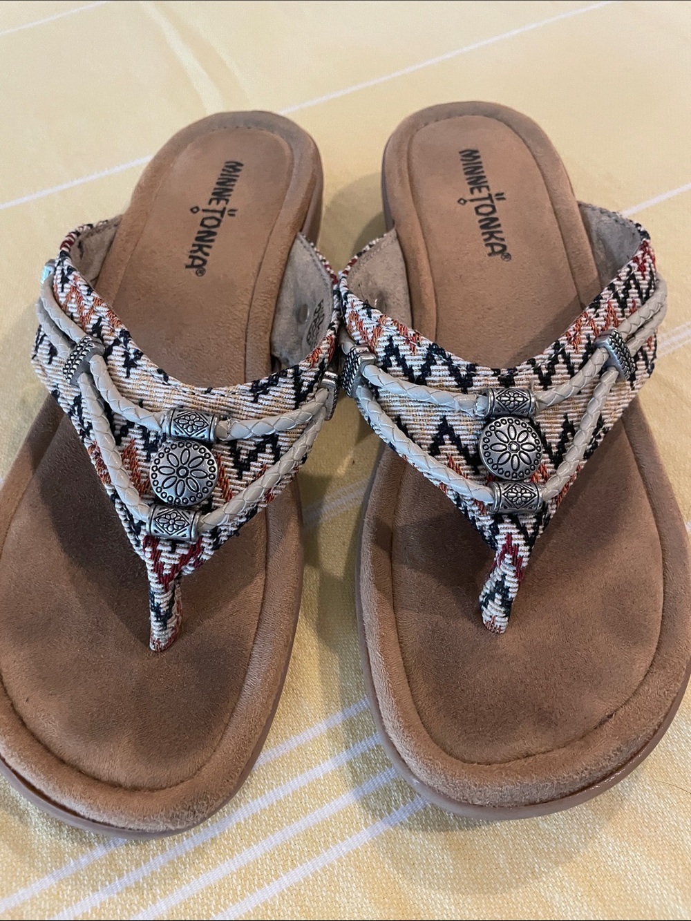 Minnetonka Women's Multicolor Patterned Fabric Thong Sandals with Silver Conchos